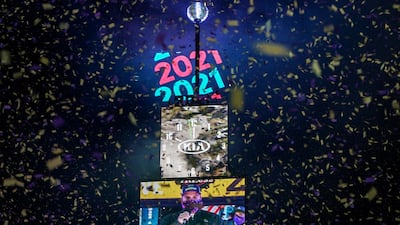 Confetti flies around the ball and countdown clock in Times Square during the virtual New Year's Eve event following the outbreak of the coronavirus disease (COVID-19) in the Manhattan borough of New York City, New York, U.S. Reuters