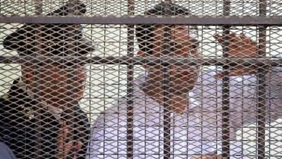 The former state security policeman, Mohsen al Sukkari (right) addresses the court in April from behind bars during his trial in the murder of Lebanese singer Suzanne Tamim.