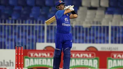 Darwish Rasooli of Afghanistan plays a shot.
