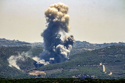 Smoke billows from the site of an Israeli air strike on southern Lebanon on June 12. AFP