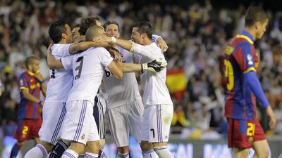 Madrid celebrate beating Barca in the 2011 final. Andres Kudacki / AFP