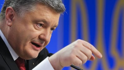 Ukrainian president Petro Poroshenko decision to move towards Nato membership has riled the country's far bigger and more powerful neighbour, Russia. Photo: Sergey Dolzhenko / EPA