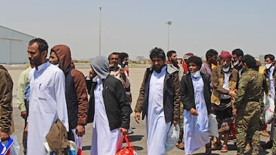 Yemenis arrive at Aden airport after being released in a prisoner swap between the government and the Houthi rebels in October 2020. Wail Shaif / dpa