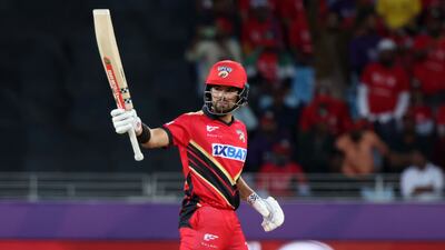 Max Holden celebrates reaching his half-century for Desert Vipers.