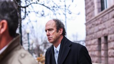 Paul Erickson leaves the federal courthouse on Tuesday, Nov. 26, 2019, in Sioux Falls, S.D. AP