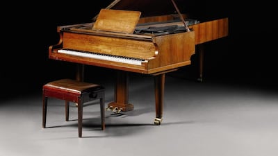 An undated handout image provided by Sotheby’s showing the ABBA piano – an instrument on which the Swedish pop group recorded some of their songs, which will be offered at the auction house’s Rock and Pop sale in London on 29 September. EPA/Sotheby’s