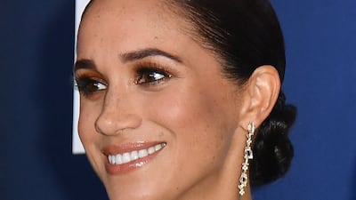 Meghan, Duchess of Sussex dazzled in a white off-the-shoulder dress. AFP