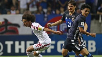 Omar Abdulrahman, left, in action during the UAE's 2018 Fifa World Cup qualifying victory over Japan in September. Shuji Kajiyama / AP Photo
