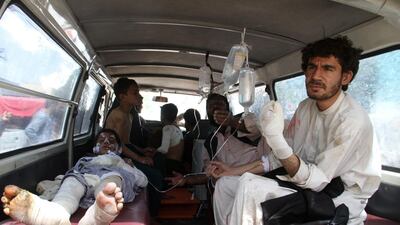An Afghan boy, who was injured in a road accident, is brought to local hospital in Ghazni, Afghanistan on May 8, 2016 in one of the country's worst road accidents. More than 70 people were killed with many burned beyond recognition. Sayed Mustafa/ EPA