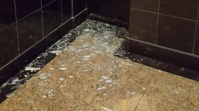 A shattered window is pictured near the scene of the explosion. Neha Jain via Twitter / via Reuters