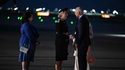 Mr Biden meets Ms Tolhurst. AFP