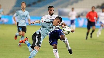 The Chilean striker Carlos Munoz, left, was sent from Baniyas to Arabian Gulf League champions Al Ahli just before the league's transfer deadline expired on Thursday night. Al Ittihad