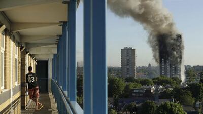 Smoke billows from a building in London. Matt Dunham / AP Photo