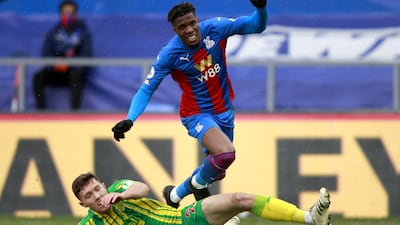 Wilfried Zaha of Crystal Palace iagainst Dara O'Shea of West Brom. EPA