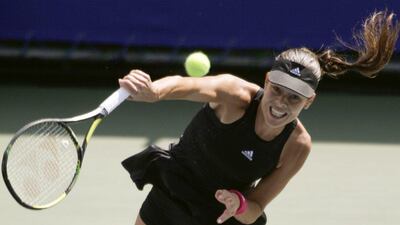 Ana Ivanovic plays a serve during her win over Caroline Wozniacki in the Pan Pacific Open final on Sunday in Tokyo. Kimimasa Mayama / EPA / September 21, 2014
