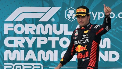 Red Bull's Mexican driver Sergio Perez on the podium after finishing second in Miami. AFP