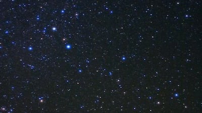 Sirius, top, and Canopus, also known as the Suhail star, seen at the horizon, are the two brightest stars in the night sky. iStockphoto.com