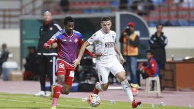 Rodrigo Lima, right, scored in the third minute of Al Ahli’s 4-1 away victory over Al Shaab at Sharjah last night to take his league tally to 11 goals. Hasan Al Raesi / Al Ittihad