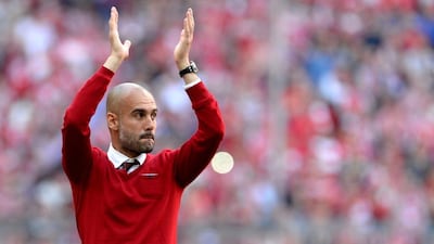 Bayern Munich manager Pep Guardiola applaus following a Bundesliga match against Stuttgart at the Allianz Arena in Munich on May 10, 2014. Andreas Gebert / EPA