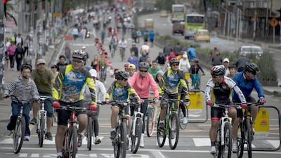 Cyclists enjoy a temporary closure of Bogota's streets. (Eitan Abramovich / AFP)
