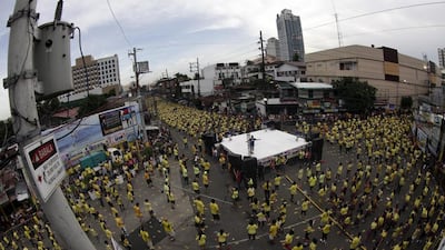 Thousands of Filipinos perform in an attempt to break the Guinness World Record for having the largest Zumba class in a street in Mandaluyong city, eastern Manila, Philippines. The Philippines set a new world record for holding the world’s biggest Zumba class after Guinness World Record adjudicator Allan Pixley confirmed at least 12,975 people took part in the Zumba class in Mandaluyong city. Francis R Malasig / EPA