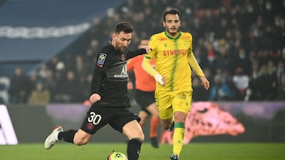 Paris Saint-Germain's Argentinian forward Lionel Messi kicks the ball. AFP