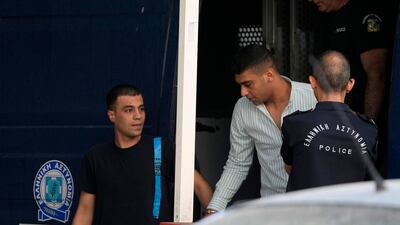 Two of the accused arriving at court. AP