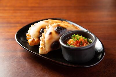 The restaurant serves crispy empanadas with delicious fillings. Photo: Brute KSA