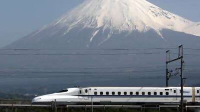 5. A Shinkansen bullet train zips past Mount Fuji. Japan is set to launch a new high-speed train on Kyushu island. Bloomberg