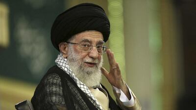 Iran's Ayatollah Ali Khamenei waves during a meeting in Tehran on September 7, 2014. AP Photo