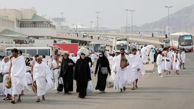 Muslim pilgrims leave the Grand Mosque, walking toward Mina during the Hajj on October 2. Saudi Arabia sought to assure the public that the kingdom was safe and free of health scares as an estimated two million Muslims streamed into a sprawling tent city near Mecca on Thursday for the start of the annual Islamic hajj pilgrimage. Khalid Mohammed / AP Photo