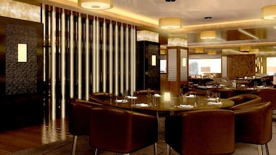 The dimly lit Caramel features dark-wood interiors. Courtesy Caramel Restaurant & Lounge