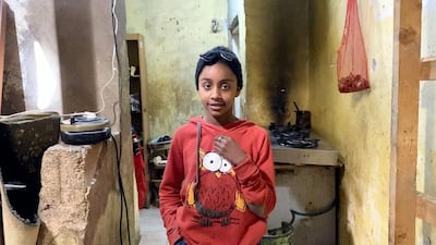 Wafa Al Bureisi's daughter stands in her family's home in the Gaza camp. Amy McConaghy / The National