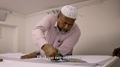 A still from the documentary, A Place Called Home. Kalam Noor, from Bangladesh, runs a tailoring business in Dubai.