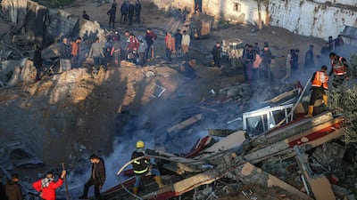 Members of the Palestinian civil defence extinguish a fire in a building following Israeli bombardments east of Rafah in the southern Gaza Strip on February 19, 2024. AFP