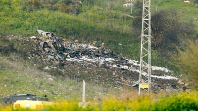 A picture taken in the northern village of Harduf on February 10, 2018, shows the remains of an Israel F-16 that crashed after coming under fire by Syrian air defences during attacks against "Iranian targets" in the war-torn country. Jack Guez / AFP