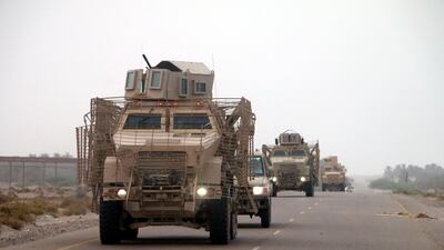 Yemeni forces backed by the Saudi-led coalition gather near the outskirts of the western port city of Hodeidah, Yemen, June 12 2018. Najeeb Almahboobi / EPA Photo