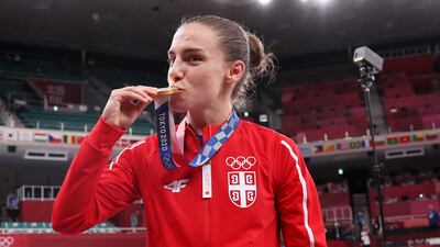 Gold medalist Jovana Prekovic of Serbia poses with her medal during the medal ceremony for the women's kumite -61kg during the karate events.