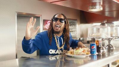 This screen grab from video provided by PepsiCo shows an image from the company's 2019 Super Bowl NFL football spot featuring Lil Jon. Star power abounds in this year’s Super Bowl ads. AP