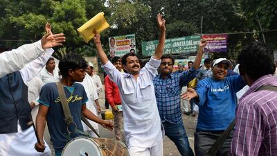 Indian activists and supporters from Janta Dal United party celebrate in New Delhi after an election victory in Bihar state by an alliance, led by their party, on November 8, 2015. Sajjad Hussain/ AFP Photo