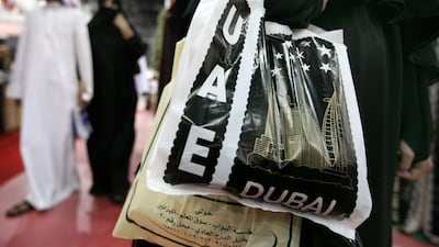 Go on, shop 'til you drop ... but don't expect it to bring you any bigger sense of fulfilment. Jeff Topping / The National