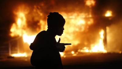 People's outrage after a grand jury returned no indictment in the shooting of Michael Brown in Ferguson highlighted a problem that the US should discuss. (REUTERS/Jim Young)