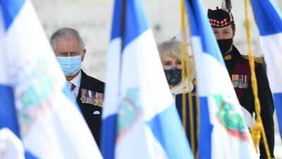 Prince Charles and Camilla during the wreath laying ceremony. Getty Images