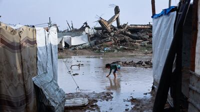 A huge puddle at a makeshift camp in Zeitoun, Gaza city. AFP