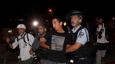 Israeli police arrest a Palestinian activist during a demonstration in support of Palestinian families that face eviction from their homes at Sheikh Jarrah neighbourhood, near Damascus Gate in the Old City of Jerusalem. EPA