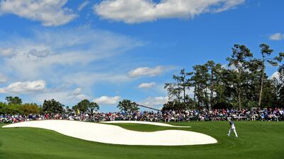 Sergio Garcia heads to the 18th green during the second round. AFP