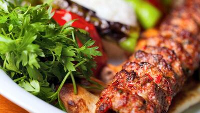 Meat is grilled freshly for diners at one of Turquoise's many live cooking stations.