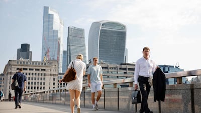 Despite all Covid-19 restrictions being lifted across England on July 19, UK business activity slowed last month. AFP