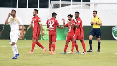 Emirates (white) vs Al Jazira (red) during an Arabian Gulf League football match on 28 April 2016. (Courtesy AGL)
