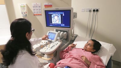 Doctor Sunita Gandhi, Specialist, Radiology, scans pregnant patient at Bright Point Women's Hospital in Abu Dhabi. Ravindranath K / The National